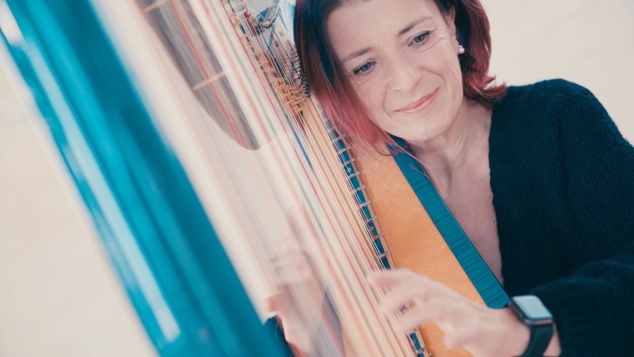 The Milan Harpist